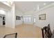 Open-concept living room featuring vaulted ceilings and plenty of natural light at 6120 Farm Rd, Las Vegas, NV 89131