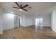 Open-concept living room with sleek flooring and minimalist design, creating a modern and airy ambiance at 617 Carpenter Dr, Las Vegas, NV 89107