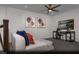 A versatile bonus room space showcases a comfortable seating area and a built-in desk at 6668 Nimbus Ave # Lot 22, Las Vegas, NV 89130