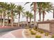 Sky Pointe neighborhood entrance with a stone sign and well-maintained landscaping at 6868 Sky Pointe Dr # 1087, Las Vegas, NV 89131