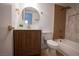 Bathroom featuring a tub/shower combo with a tiled surround and a modern vanity at 7932 Diamond Rock Way # 101, Las Vegas, NV 89128