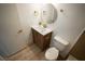 Bathroom with a modern sink vanity, brushed gold accents, and a toilet at 7932 Diamond Rock Way # 101, Las Vegas, NV 89128