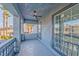 Exterior view of a covered balcony with palm tree views at 8625 Scarsdale Dr, Las Vegas, NV 89117