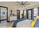 Bedroom with ensuite bathroom, walk-in closet, and an abundance of natural light at 8625 Scarsdale Dr, Las Vegas, NV 89117