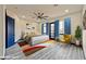 Staged bedroom showcases ample natural light, a large bed, and blue accents for a modern feel at 8625 Scarsdale Dr, Las Vegas, NV 89117