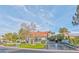 Charming single-story home with a well-manicured lawn, mature trees, and a spacious driveway at 8625 Scarsdale Dr, Las Vegas, NV 89117