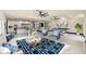 Bright, modern living room with sleek furnishings and a stylish area rug at 8625 Scarsdale Dr, Las Vegas, NV 89117