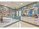 Spacious main bath features luxury tile, glass shower, soaking tub, dual vanities, and custom mirror at 8625 Scarsdale Dr, Las Vegas, NV 89117