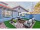 Inviting patio area featuring stylish outdoor seating and a cozy fire pit at 8625 Scarsdale Dr, Las Vegas, NV 89117