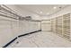 Walk-in closet is equipped with custom shelves and clothing racks with plenty of space at 8625 Scarsdale Dr, Las Vegas, NV 89117