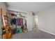 Bedroom featuring a closet, carpeted floor, and a nearby door to the bathroom at 917 Boulder Springs Dr # 202, Las Vegas, NV 89128