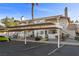 Condo building showing assigned parking and well-kept landscaping at 917 Boulder Springs Dr # 202, Las Vegas, NV 89128