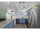 Bright kitchen with stainless steel appliances, granite countertops, and well-designed lighting at 917 Boulder Springs Dr # 202, Las Vegas, NV 89128