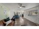 Open concept living space with a modern kitchen and comfortable lounge area at 917 Boulder Springs Dr # 202, Las Vegas, NV 89128