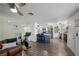 Cozy living space with an open kitchen and a leather sofa, filled with natural light at 917 Boulder Springs Dr # 202, Las Vegas, NV 89128