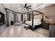Spacious bedroom with canopy bed, chaise lounge, and decorative ceiling fan at 9325 Canyon Classic Dr, Las Vegas, NV 89144
