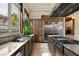 Spacious kitchen with stainless steel appliances, island cooktop, and granite countertops at 9325 Canyon Classic Dr, Las Vegas, NV 89144