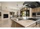Gourmet kitchen island view with stainless appliances, and views to the outdoor space at 9325 Canyon Classic Dr, Las Vegas, NV 89144
