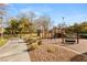 A neighborhood playground and walkway offers a safe and fun recreational area surrounded by manicured landscaping at 9325 Canyon Classic Dr, Las Vegas, NV 89144