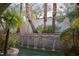 Scenic water feature with tiered waterfalls surrounded by mature landscaping at 9325 Canyon Classic Dr, Las Vegas, NV 89144