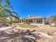 A lush backyard oasis provides the perfect spot to relax at 11 Canoa Hills Dr, Henderson, NV 89052
