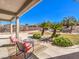 Covered patio with seating and landscaping at 11 Canoa Hills Dr, Henderson, NV 89052