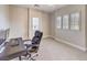 Bright bedroom with neutral walls, a desk area, and shuttered windows at 11 Canoa Hills Dr, Henderson, NV 89052
