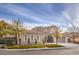 Wonderful home featuring a tile roof, multiple car garage, professionally landscaped yard, and green lawn at 11 Canoa Hills Dr, Henderson, NV 89052