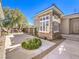 Charming front yard boasting stone accents and manicured landscaping at 11 Canoa Hills Dr, Henderson, NV 89052