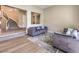 Bright living room with modern furniture and staircase at 11 Canoa Hills Dr, Henderson, NV 89052