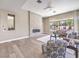 Spacious living room with a tiled fireplace and a view of the backyard at 11 Canoa Hills Dr, Henderson, NV 89052
