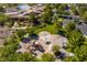 Aerial view of the community playground with slides, swings, and sand areas at 11 Canoa Hills Dr, Henderson, NV 89052