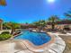 Pool and backyard with palm trees at 11 Canoa Hills Dr, Henderson, NV 89052