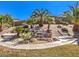 A stunning backyard waterfall at 11 Canoa Hills Dr, Henderson, NV 89052