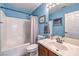 This is a classic bathroom with a shower-tub combination and a single sink vanity at 1590 Raining Hills St, Henderson, NV 89052
