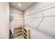 Spacious walk-in closet with wire shelving and storage solutions offers ample storage space at 1590 Raining Hills St, Henderson, NV 89052