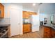 Kitchen featuring stainless steel appliances, wood cabinets, and granite countertops at 1653 Sun Canyon Ct, Las Vegas, NV 89128