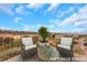 Cozy outdoor seating area with scenic views, perfect for relaxation and conversation at 2062 Dipinto Ave, Henderson, NV 89052