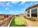 Lush backyard featuring a putting green and stunning views at 2062 Dipinto Ave, Henderson, NV 89052