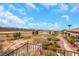 Backyard view overlooking the lush golf course and desert landscape at 2062 Dipinto Ave, Henderson, NV 89052