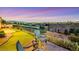 Outdoor seating on a patio overlooking the golf course and desert landscape at 2062 Dipinto Ave, Henderson, NV 89052