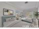 Inviting bedroom with twin beds, soft lighting, and stylish decor at 2062 Dipinto Ave, Henderson, NV 89052