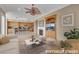 Spacious living room with a fireplace, TV, and barstool seating at 2062 Dipinto Ave, Henderson, NV 89052