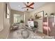 Comfortable office with natural light, glass desk, and stylish decor at 2062 Dipinto Ave, Henderson, NV 89052