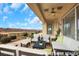 Inviting outdoor patio featuring stylish furniture and scenic views of the golf course at 2062 Dipinto Ave, Henderson, NV 89052