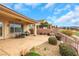 Relaxing patio space with comfortable seating and a charming water feature at 2062 Dipinto Ave, Henderson, NV 89052