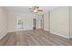 Bright and airy living room showing wood flooring, neutral paint, and multiple entryways at 2508 Rancho Bel Air Dr, Las Vegas, NV 89107