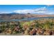 Stunning aerial shot of a luxury lakeside community with beautiful homes and mountain views at 30 Via Tiberius Way, Henderson, NV 89011