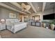 Calm bedroom with wood beams, calming color palette, and bright light from the window at 30 Via Tiberius Way, Henderson, NV 89011