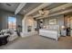 Relaxing bedroom featuring a fireplace, wood beams, and a neutral color palette at 30 Via Tiberius Way, Henderson, NV 89011